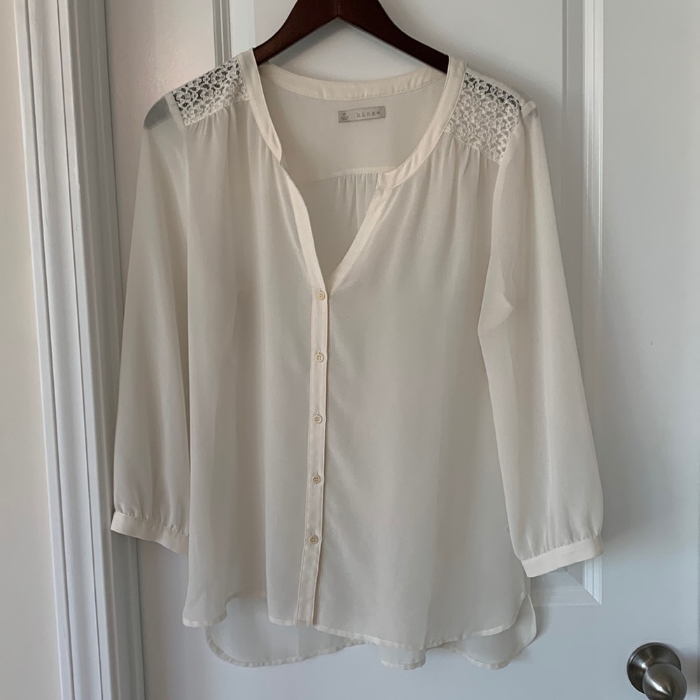 Hinge white blouse with floral shoulder detail
